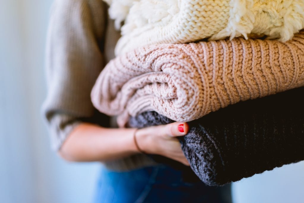 Wash Any Linens, Throw Rugs, or Blankets in the Rooms