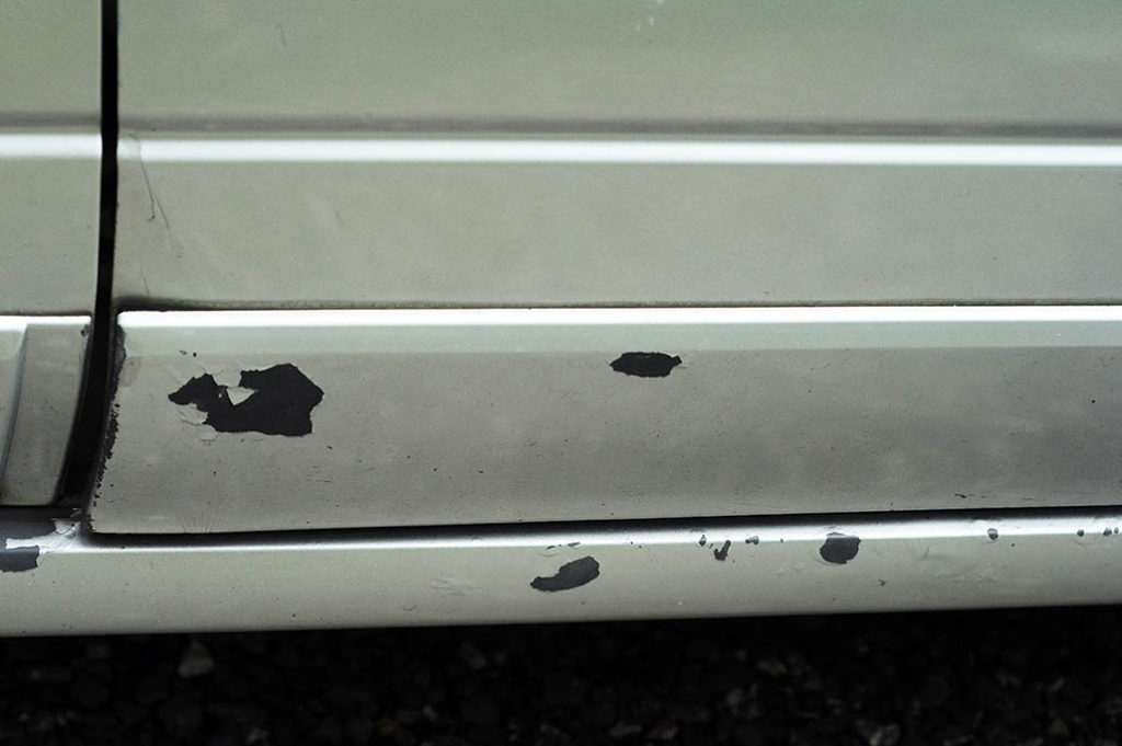 close up chipped paint on the car