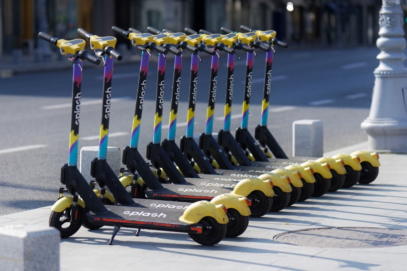 electric scooters parked at road side