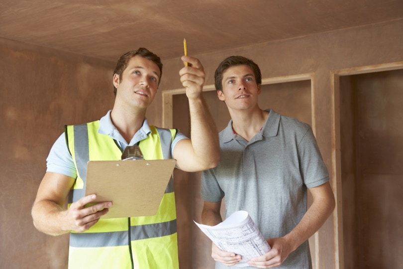 man checking a property