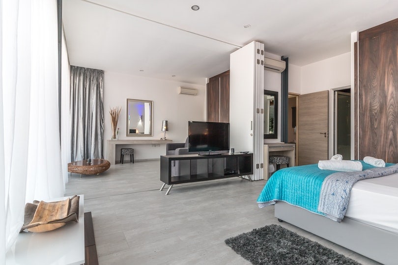 modern bedroom design with gray laminated flooring