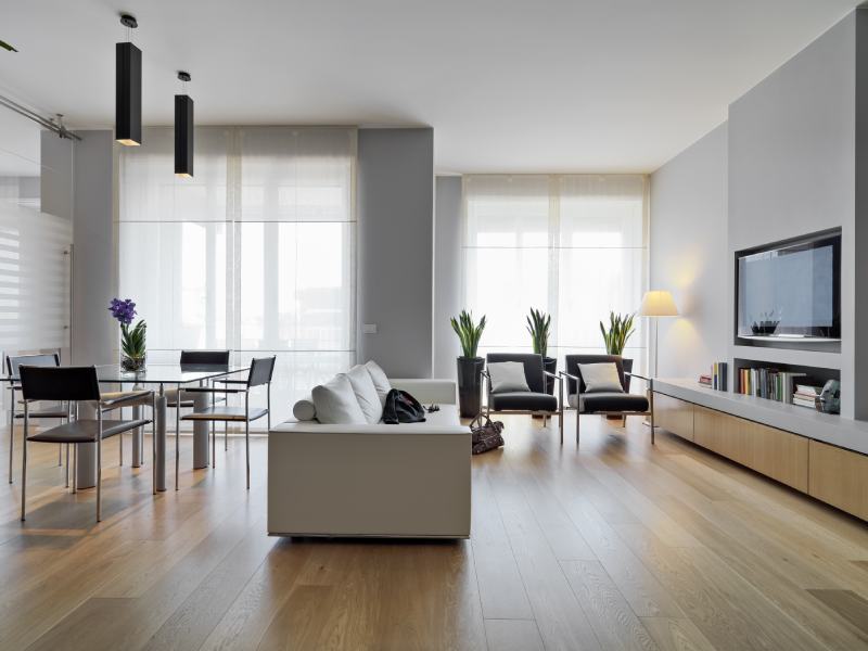 modern living room and the glass dining table the wood floor