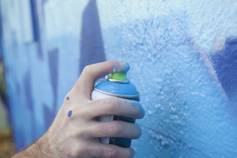 spray painting on wall