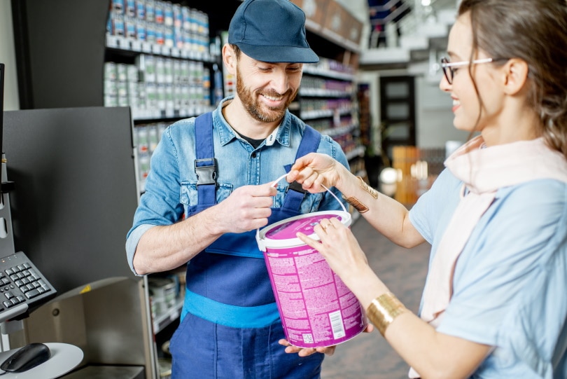 woman buying paint
