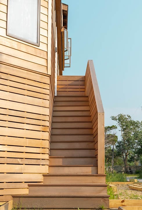 wooden house with stairs