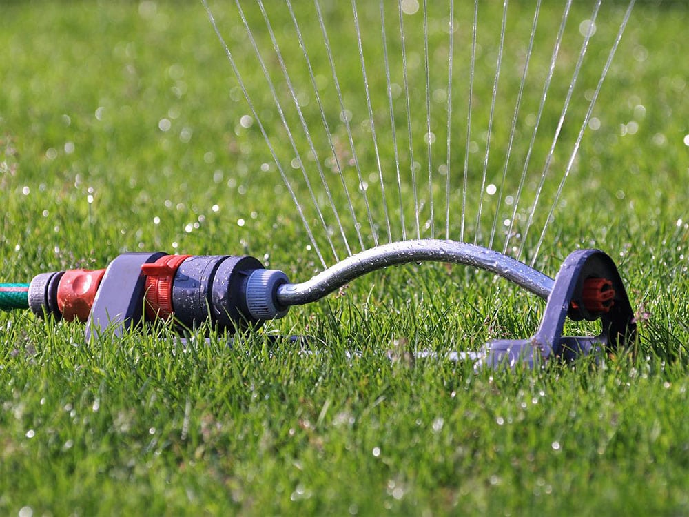 Oscillating Sprinkler on the ground