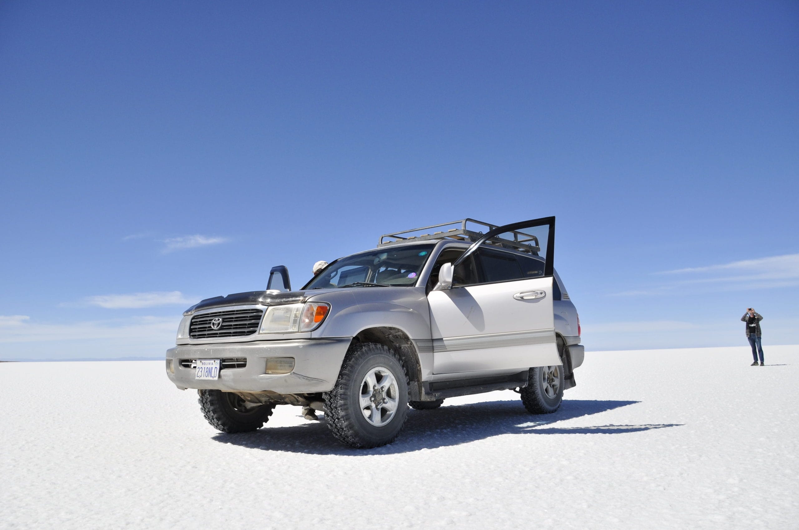 Silver Toyota Highlander in desert
