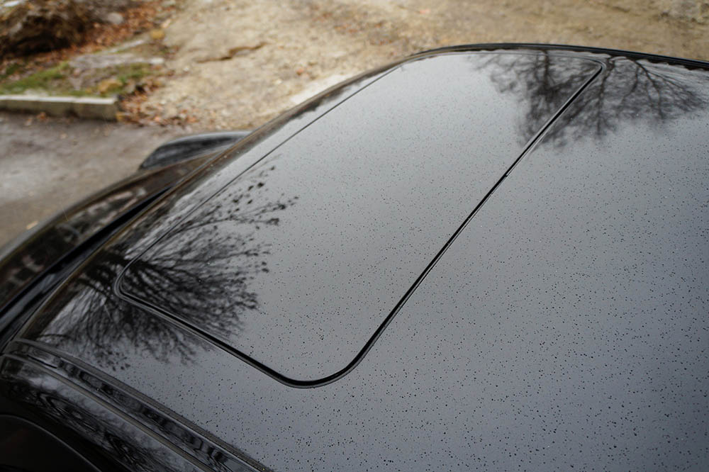 black car with closed sunroof
