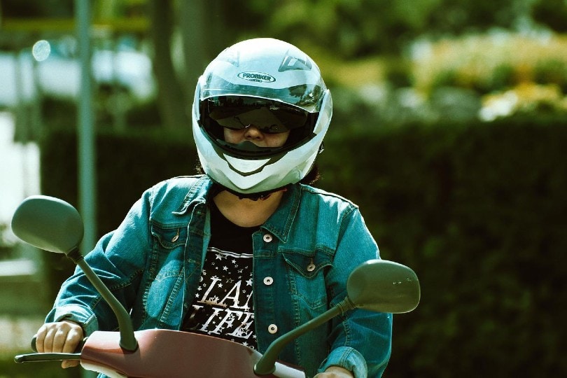 female rider wearing her helmet