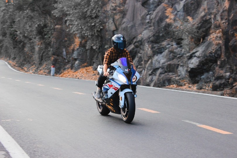 male rider riding his motorcycle