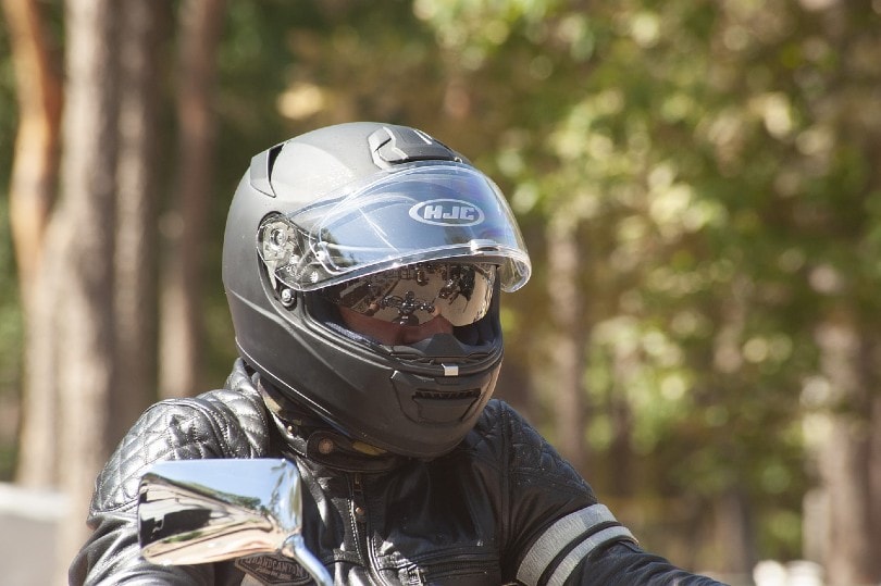 man riding motorcycle