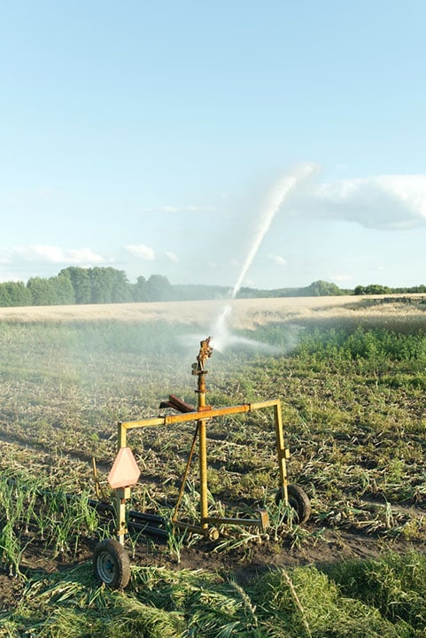 traveling sprinkler used on a farm