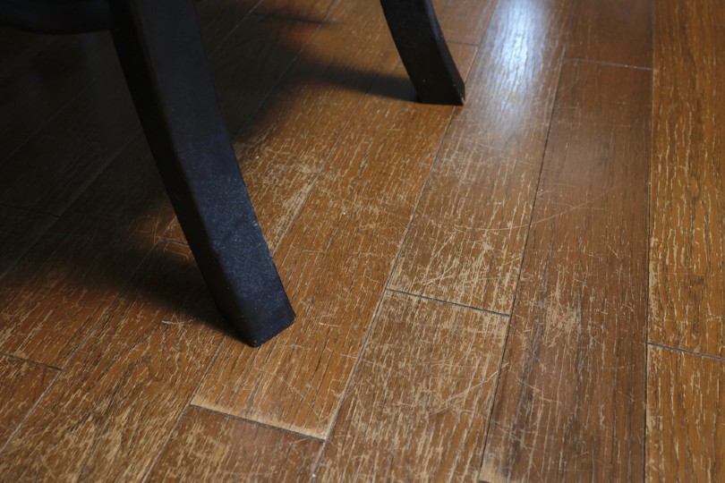 wooden floor with lots of scratch marks