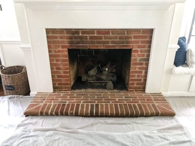 DIY lime washed brick fireplace