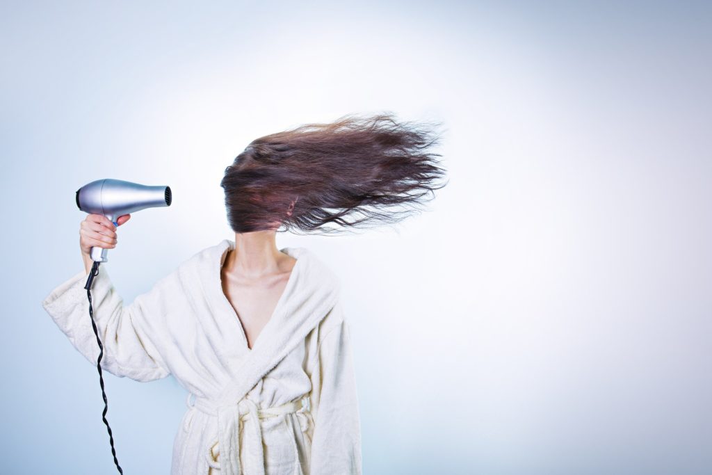 Woman blower her hair