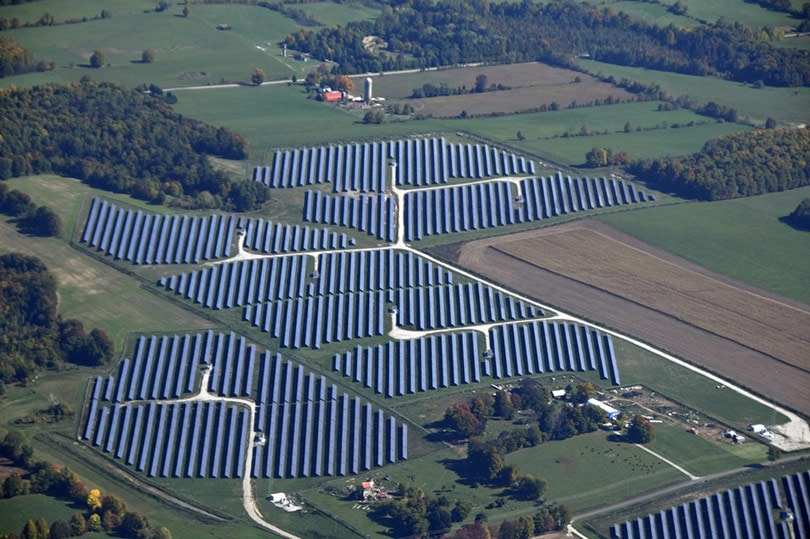 aerial view of photovoltaic solar panels in the rural area of southern ontario, canada