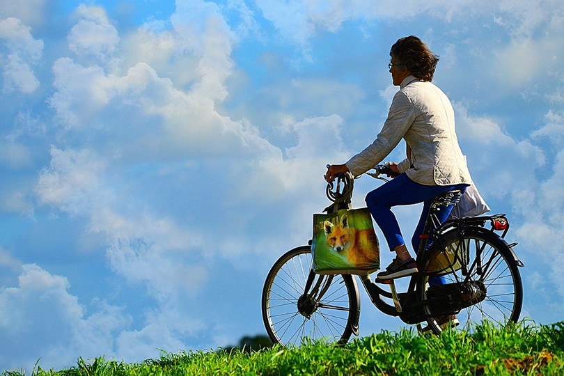 Woman Riding Bicycle