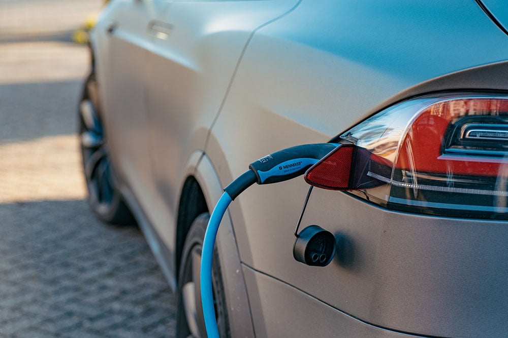 close up tesla car charging