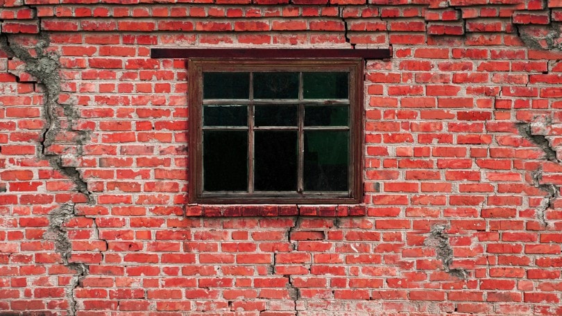 crack all over a house brick wall
