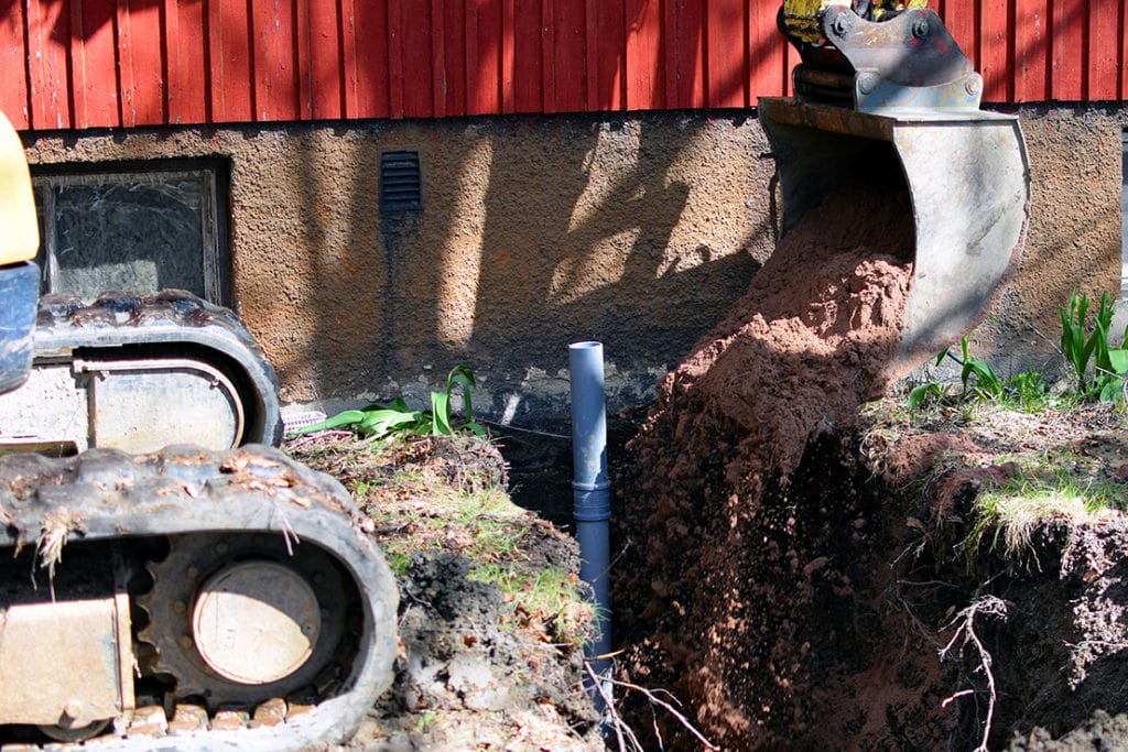 excavating the sewer line of the house