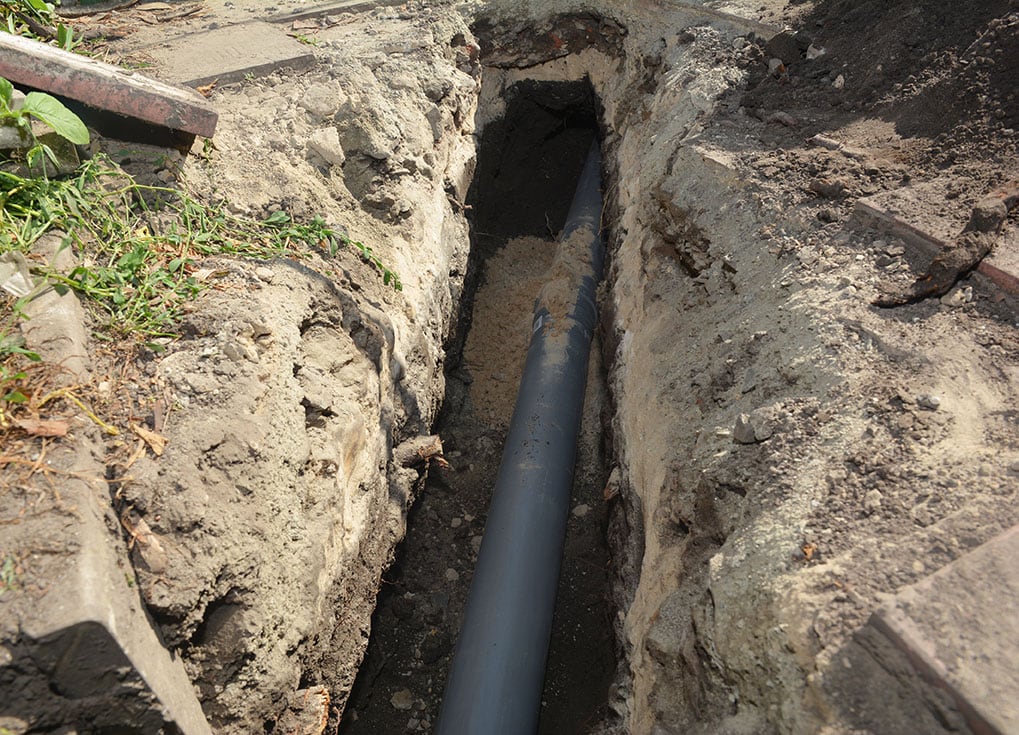 Installing sewer pipe under the house