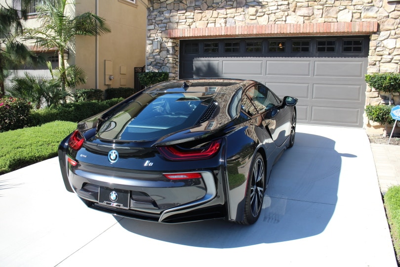 black BMW car in the driveway