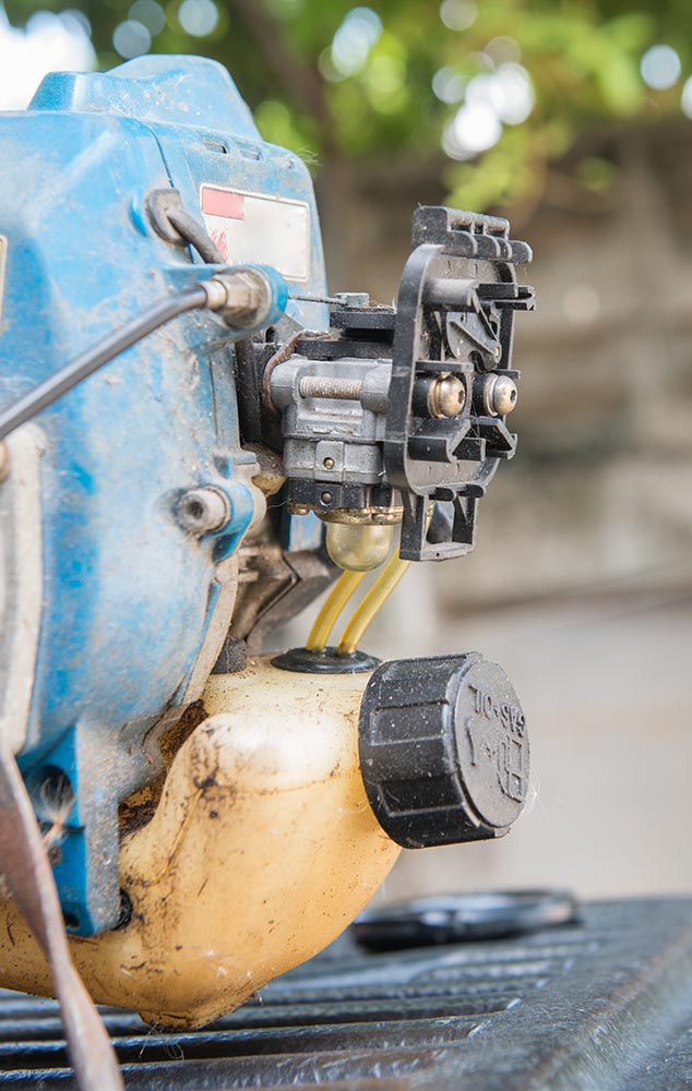 clogged carburator of old lawnmower