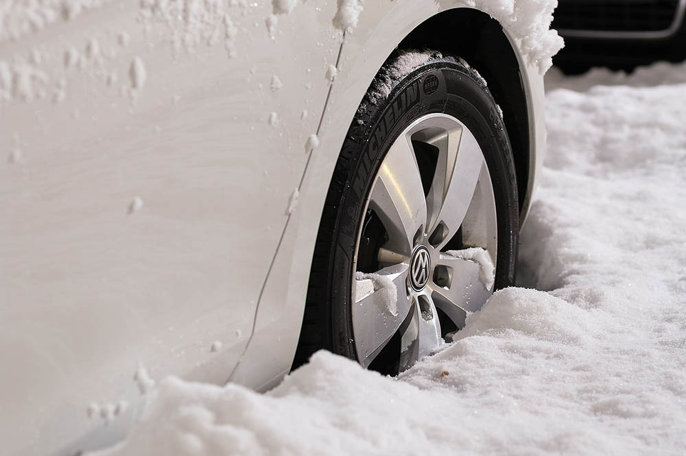 close up car tire during winter