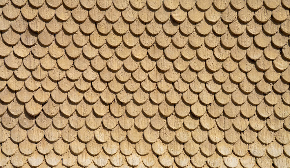 close up light yellow architectural shingles