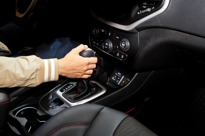 man driving automatic transmission car