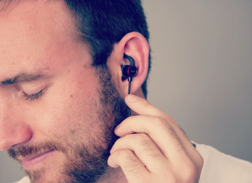 man using ear phones