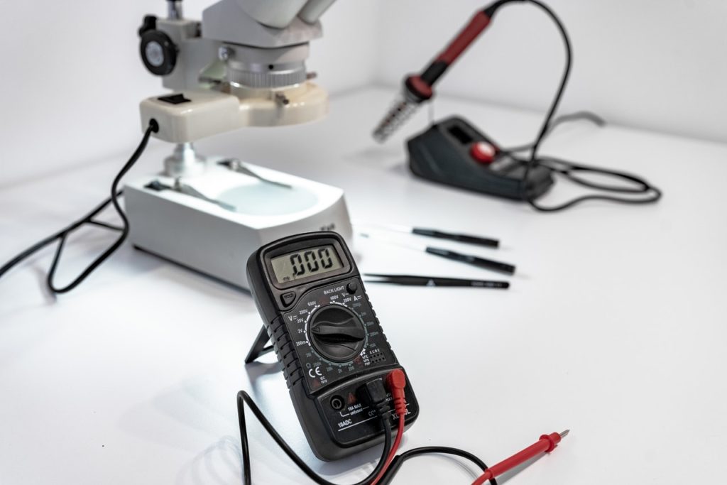 multimeter on a white surface