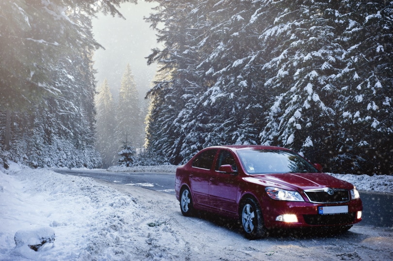 red car in snow