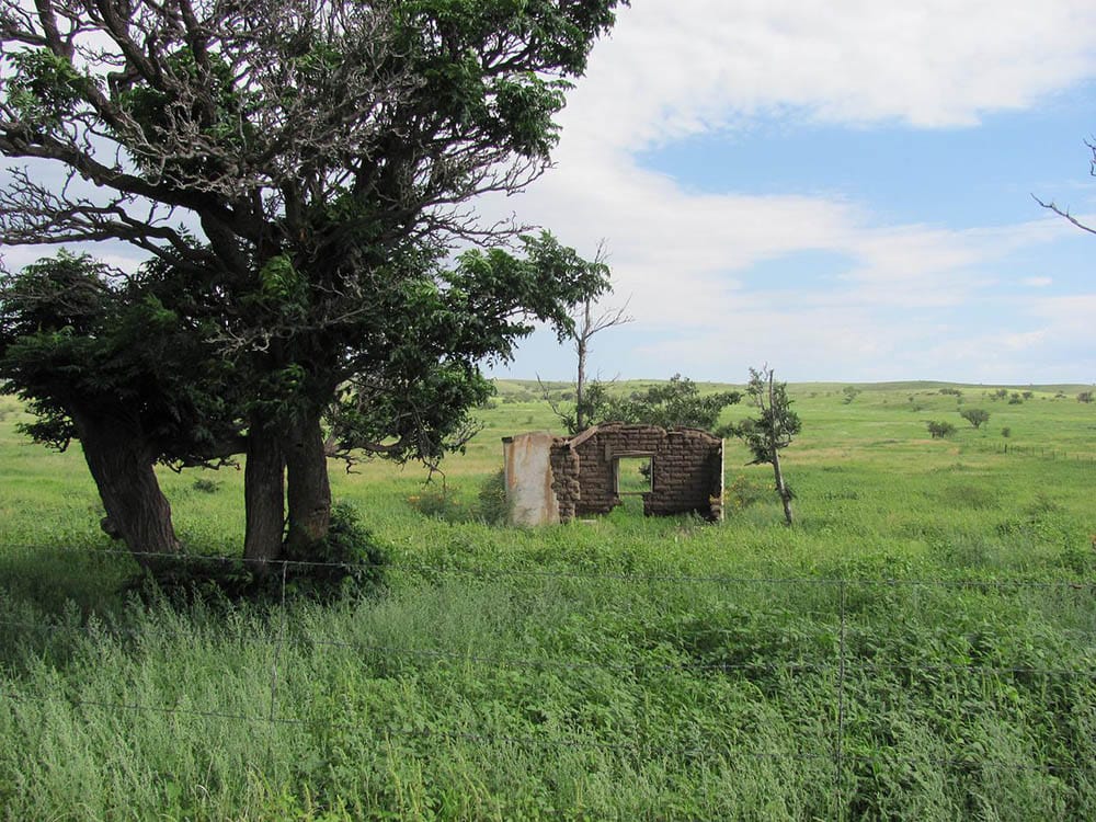 ruins in Arizona in the middle of grass field