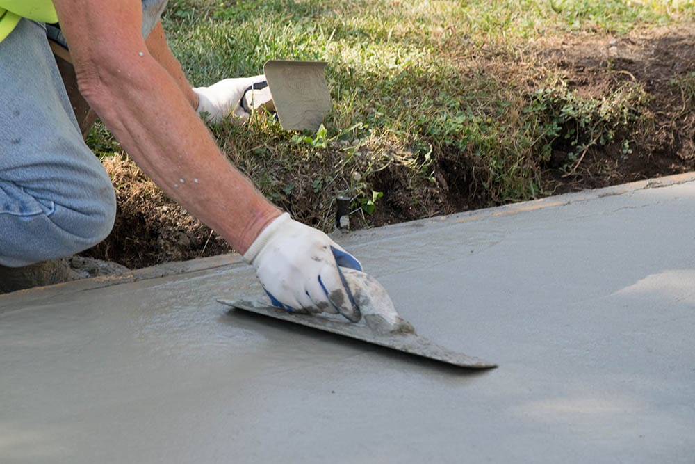 smoothening the concrete driveway