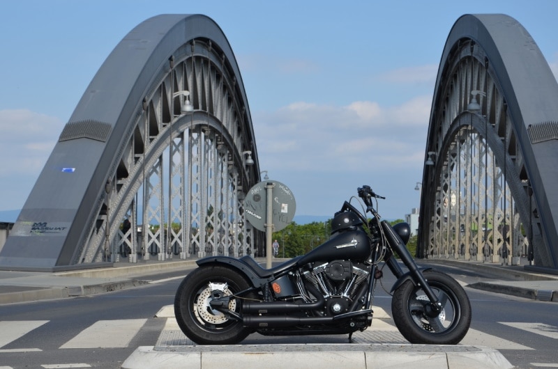 Black Harley Davidson motorcycle with Z-bar handlebars