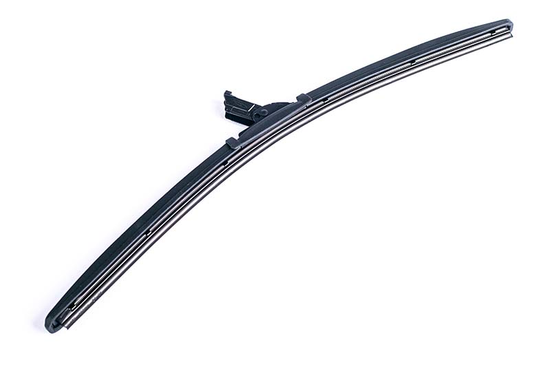 Frameless flat wiper blade with adapters on isolated white background