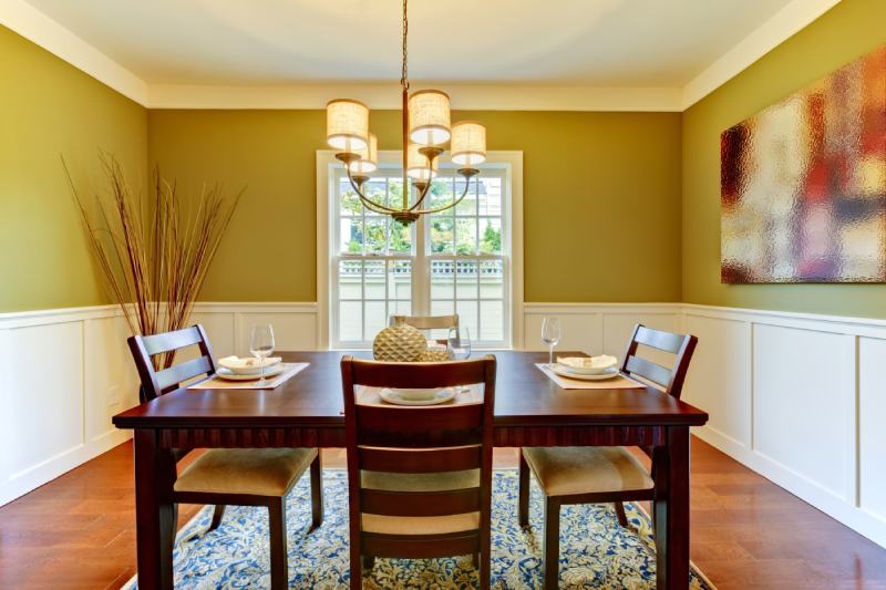 Green craftsman large dining room with cherry floor