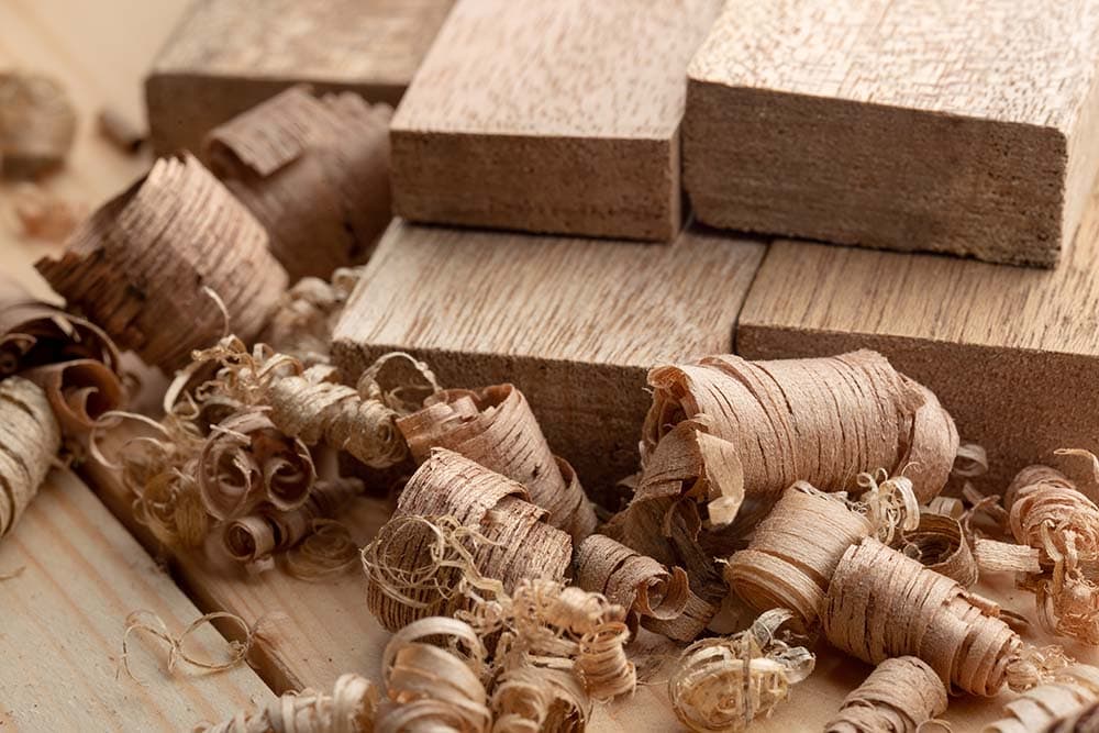 Mahogany wood block and wood shavings