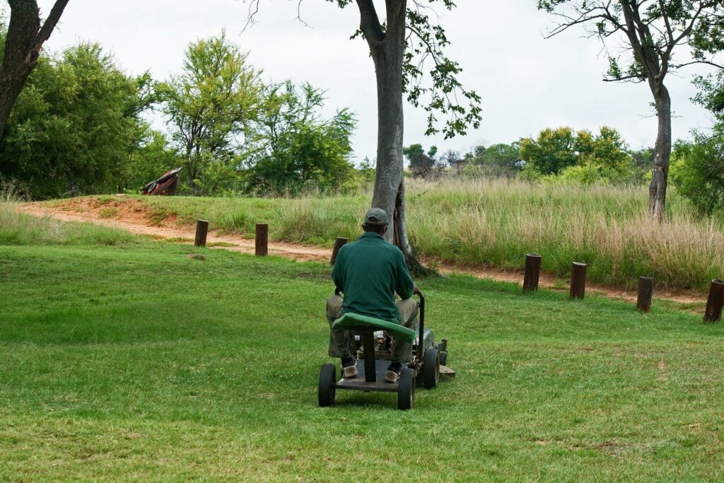 Old traditional ride on lawn mower