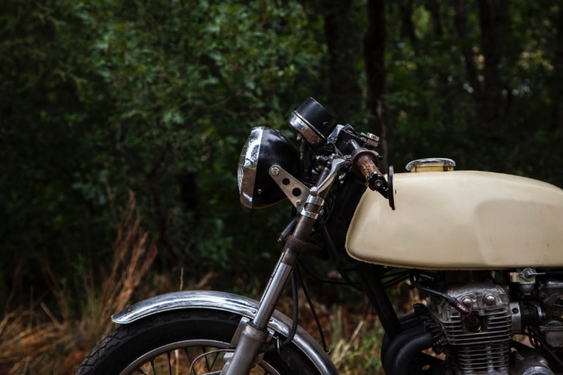 White motorcycle with clip-on handlebars