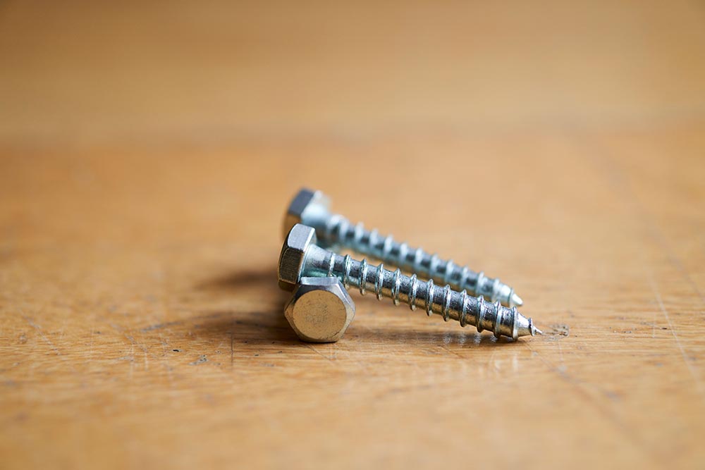 close up of three lag screws