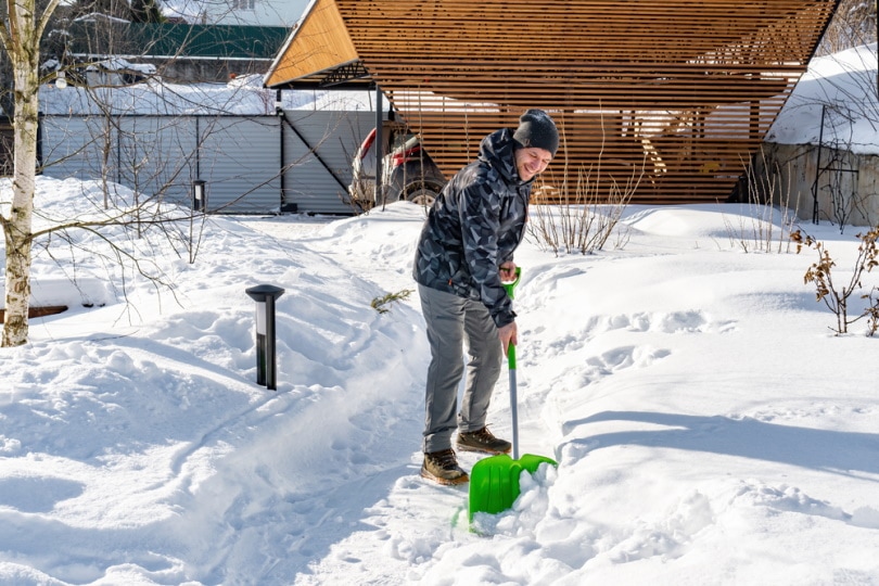 man shoveling snow