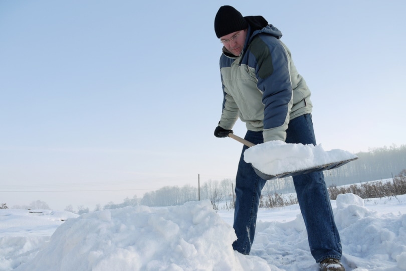 man shoveling snow