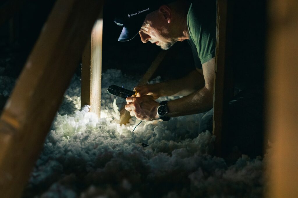 man wearing green with loose fill insulation