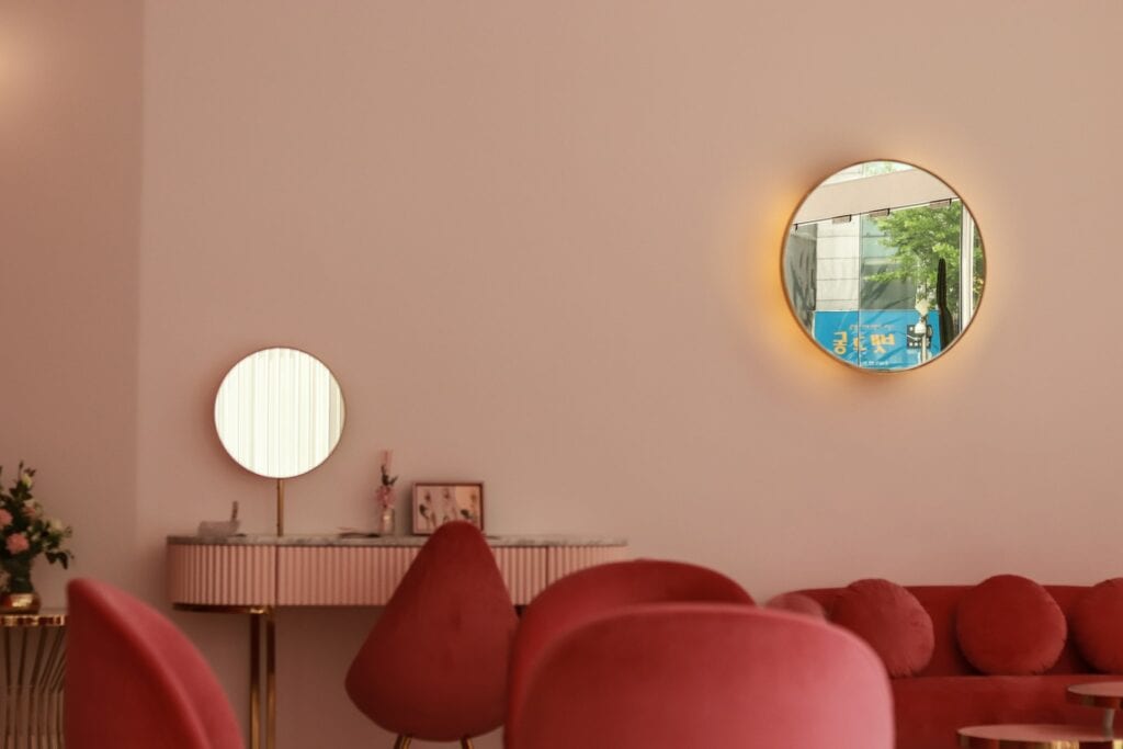 red sofa on a pink room