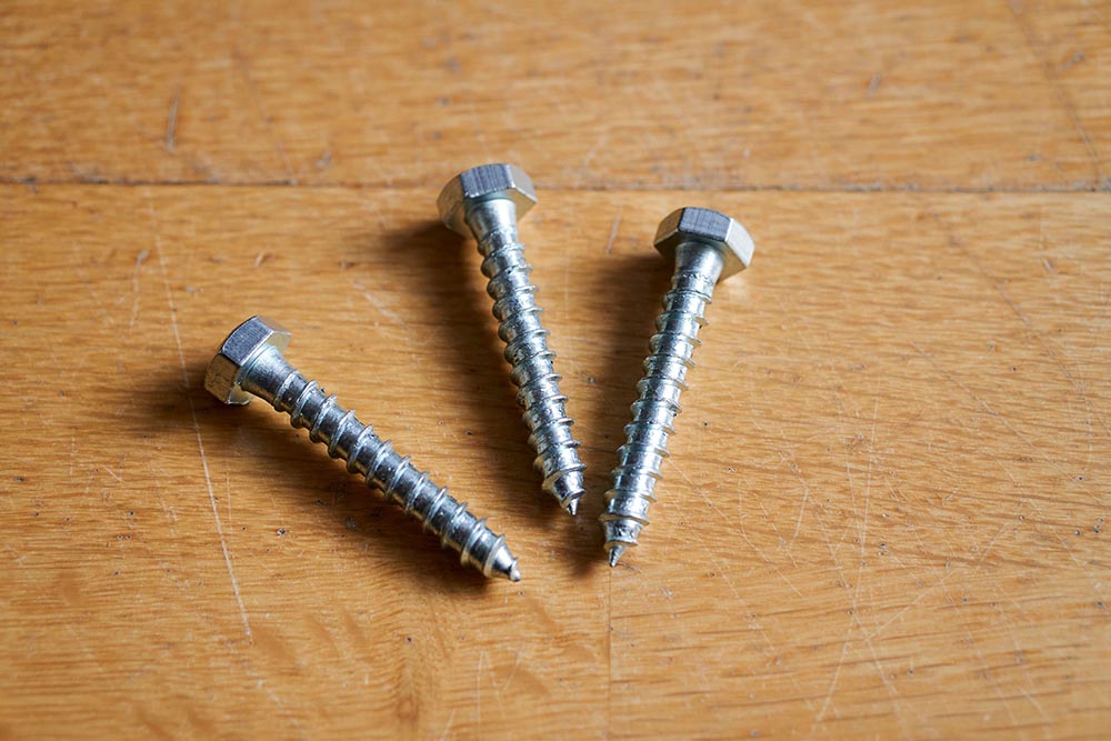 Three lag screws on the table