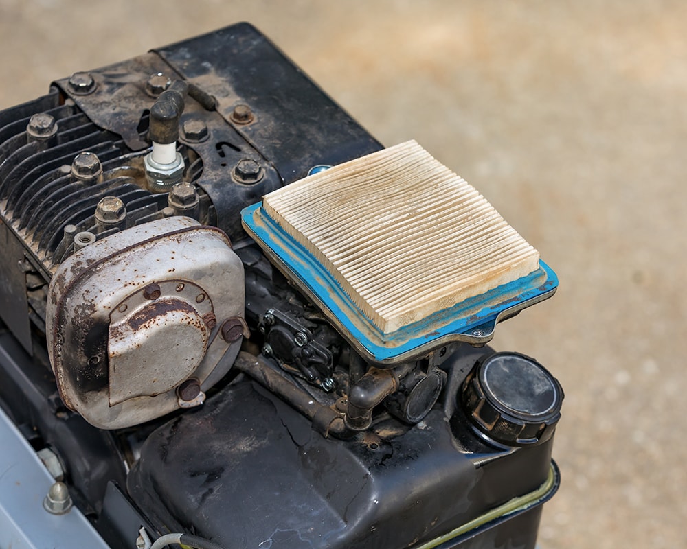 Dirty air filter on lawn mower_J.J. Gouin_Shutterstock