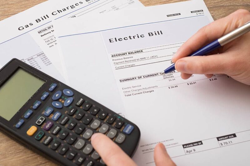 Electric-bill-paper-on-the-table_tommaso79_Shutterstock