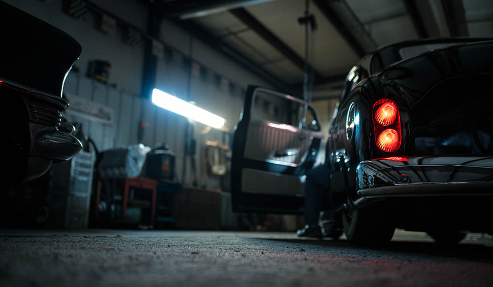 Garage with a black car
